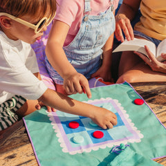 Compact travel game for kids by Quut
