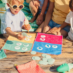 Bingo game board with colourful matching patches for toddlers